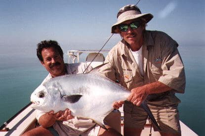 Captain Rick holding a Permit