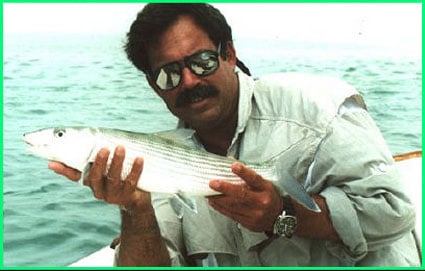 Captain Rick holding a bone fish